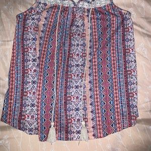 Multicolored lace blouse with tassels